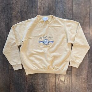 vintage embroidered golf club crewneck in pastel yellow